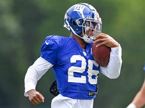 Saquon Barkley of the New York Giants runs a drill during a joint practice with the Cleveland Browns on August 19, 2021 in Berea, Ohio.