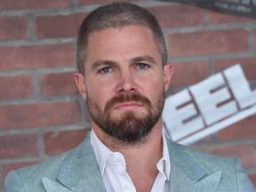 Stephen Amell arrives for the premiere of "Heels" in Los Angeles on Aug. 10, 2021.
