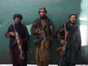 Taliban soldiers stand in Bagram Air Base in Parwan, Afghanistan, September 23, 2021.