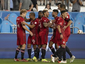 Toronto FC players celebrate Jacob Shaffelburg's goal in the 18th minute against Nashville SC at BMO Field on Saturday night.