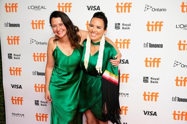 Director Danis Goulet and Producer Tara Woodbury pose at the premiere of the thriller Night Raiders, at the Toronto International Film Festival, Sept. 10, 2021.