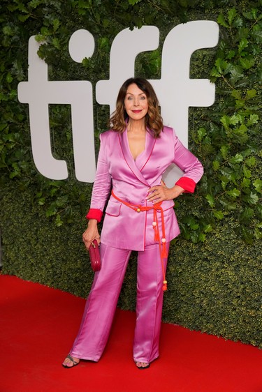 Cast member Suzanne Cyr poses on the red carpet at the premiere of the thriller Night Raiders, at the Toronto International Film Festival, Sept. 10, 2021.