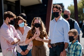Prime Minister and Liberal Party leader Justin Trudeau arrives with his family to cast his vote in the federal election in Montreal on Sept. 20, 2021.