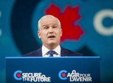 Conservative Leader Erin O'Toole addresses supporters at the Tribute Communities Centre Arena in Oshawa, Ont. following the federal election on September 21, 2021.