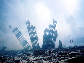 In this file photo taken on September 11, 2001, the rubble of the twin towers of the World Trade Center smoulder following a terrorist attack in lower Manhattan, New York.