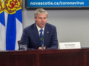 Nova Scotia Premier Tim Houston attends a COVID-19 briefing, in Halifax, Aug. 23, 2021.