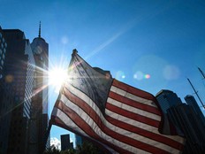 A U.S. flag flutters in the wind near the National 9/11 Memorial & Museum in New York City, Friday, Sept. 10, 2021.