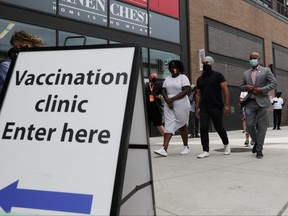 New Democratic Party NDP leader Jagmeet Singh walks to a vaccination clinic as he continues his election campaign tour in Toronto, Aug. 21, 2021.