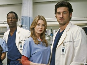 From left to right, Isaiah Washington, Ellen Pompeo and Patrick Dempsey are seen in a promotional image for medical drama "Grey's Anatomy".