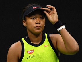Japan's Naomi Osaka reacts during her 2021 US Open Tennis tournament women's singles third round match against Canada's Leylah Fernandez at the USTA Billie Jean King National Tennis Center in New York, on September 3, 2021.