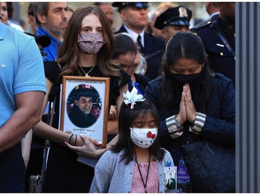 Family members and loved one of victims attend the annual 9/11 Commemoration Ceremony at the National 9/11 Memorial and Museum on Sept. 11, 2021 in New York.