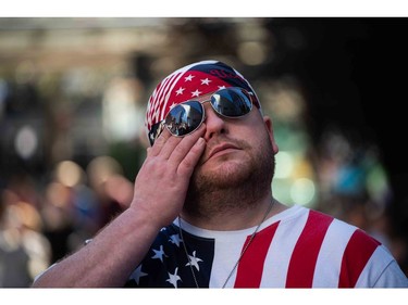 Joe Walker, a man who lives in the neighbourhood, wipes a tear from his face as he participates in the 20th anniversary of the 9/11 attacks on the World Trade Center near the 9/11 Memorial & Museum in New York, on Sept. 11, 2021.