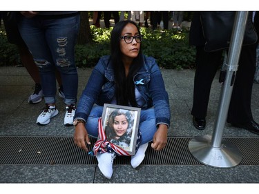 A family member of Jennie Nicole Gonzalez attends the annual 9/11 Commemoration Ceremony at the National 9/11 Memorial and Museum on Sept. 11, 2021 in New York.