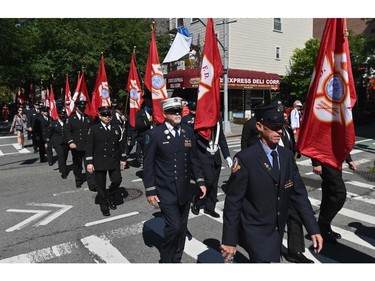 New York firefighters march as they mark the 20th anniversary of the 9/11 attacks on the World Trade Center, in New York, on Sept. 11, 2021.