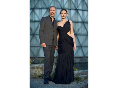 Canadian director Denis Villeneuve and Swedish actress Rebecca Ferguson arrive for the premiere of "Dune" at the Toronto International Film Festival in Toronto, Sept. 11, 2021.