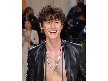 Canadian singer Shawn Mendes arrives for the 2021 Met Gala at the Metropolitan Museum of Art on September 13, 2021 in New York. - This year's Met Gala has a distinctively youthful imprint, hosted by singer Billie Eilish, actor Timothee Chalamet, poet Amanda Gorman and tennis star Naomi Osaka, none of them older than 25. The 2021 theme is "In America: A Lexicon of Fashion." (Photo by Angela WEISS / AFP)