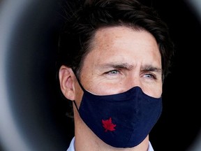 Canada's Liberal Prime Minister Justin Trudeau wears a mask before making an announcement inside the Sunwing Airlines hangar during his election campaign tour in Mississauga, Ontario, Canada, September 3, 2021.