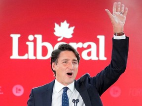 Liberal Prime Minister Justin Trudeau gestures during the Liberal election night party in Montreal, Sept. 21, 2021.