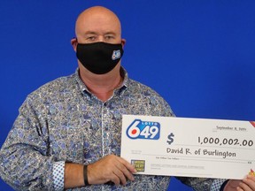 Burlington's David Rutherford with his Lotto 6/49 win.