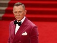 Cast member Daniel Craig poses as he arrives at the world premiere of the new James Bond film "No Time To Die" at the Royal Albert Hall in London, Britain, September 28, 2021.