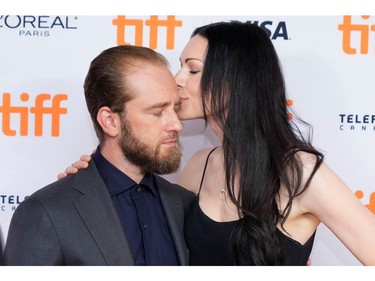 Actors Laura Prepon and Ben Foster arrive for the premiere of "The Survivor" at the Toronto International Film Festival (TIFF) in Toronto, Ontario, Canada September 13, 2021.  REUTERS/Mark Blinch