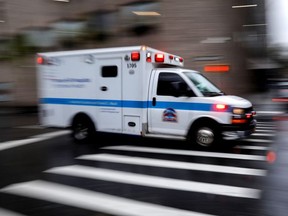 An ambulance arrives at the emergency entrance outside Mount Sinai Hospital in Manhattan during the outbreak of the coronavirus disease (COVID-19) in New York City, New York, U.S., April 13, 2020.
