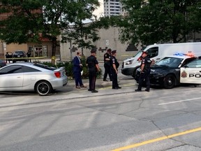 Hamilton Police investigate at the scene of a fatal shooting on Tuesday, Sept. 14, 2021. BRAD HUNTER/TORONTO SUN