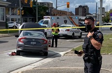 Durham Regional Police at the scene of a shooting outside a Husky gas station on Bond St. at Ritson Rod. around noon, Thursday, Sept. 9, 2021.