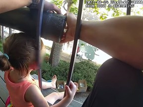 Officers in Boulder, Colorado used a battering ram to free a little girl who got her head stuck in a railing.