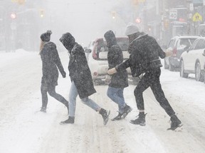 Torontonians braved the snow and cold temperatures this afternoon as Toronto was hit by the first major snow storm of 2020. Saturday, Jan. 18, 2020.