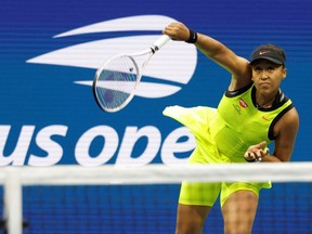 Sep 3, 2021; Flushing, NY, USA; Naomi Osaka of Japan serves against Leylah Annie Fernandez of Canada (not pictured) on day five of the 2021 U.S. Open tennis tournament at USTA Billie Jean King National Tennis Center.