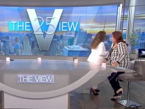 "The View" co-hosts  Sunny Hostin and Ana Navarro leave the set after being told they had tested positive for COVID-19 while the show was on air.