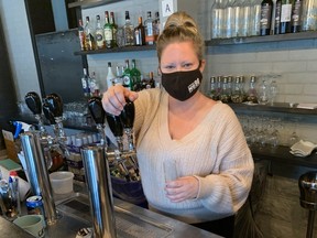 Dana Hubbard behind the bar at her Local No90 Bar and Kitchen in Port Hope.