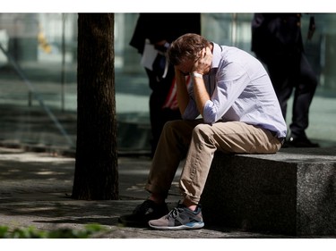 A person mourns during a ceremony on the 20th anniversary of the Sept. 11, 2001 attacks in New York City, Sept. 11, 2021.