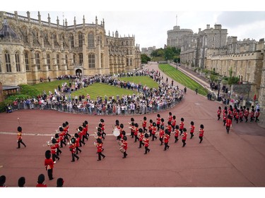 Military personnel take part in the Guard Change at Windsor Castle, during a ceremony marking the 20th anniversary of the Sept. 11, 2001 attacks, in Windsor, Britain, Sept. 11, 2021.