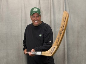 Just look at the expression on the face of Rex Ryan as he poses with his autographed Darryl Sittler stick.