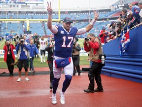 Josh Allen of the Buffalo Bills acknowledges the fans as he leaves the field after the Bills defeated the Texans 40-0 at Highmark Stadium.