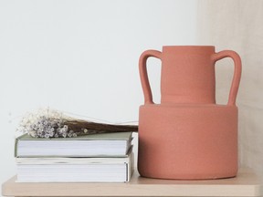 The Harlow terracotta vase from Tess Living combines subtle colour with sculpted lines. MAISON TESS