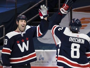Defenceman Zdeno Chara (left) has returned to the Islanders, while Alex Ovechkin continues to chase the NHL's career goals record.