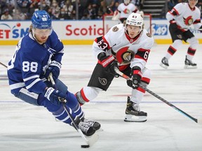 Tyler Ennis of the Ottawa Senators skates to check William Nylander of the Toronto Maple Leafs during an NHL game at Scotiabank Arena on October 16, 2021 in Toronto, Ontario, Canada.
