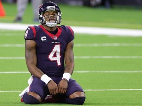 Deshaun Watson of the Houston Texans reacts to a play during a game against the Tennessee Titans at NRG Stadium on January 03, 2021 in Houston, Texas.