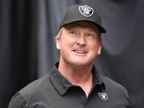 Head Coach Jon Gruden of the Las Vegas Raiders walks onto the field before a game against the Miami Dolphins at Allegiant Stadium on September 26, 2021 in Las Vegas, Nevada.