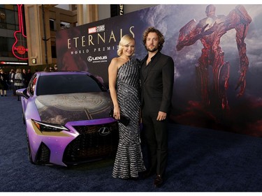 Malin Akerman and Jack Donnelly arrive for the world premiere of Marvel Studios' Eternals at the El Capitan Theatre in Hollywood on Oct. 18, 2021.