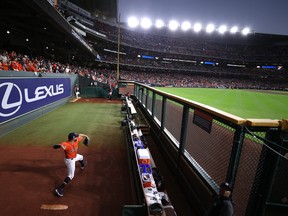 Jose Urquidy #65 of the Houston Astros warms up in the bullpen prior to Game Two of the World Series against the Atlanta Braves at Minute Maid Park on October 27, 2021 in Houston, Texas.