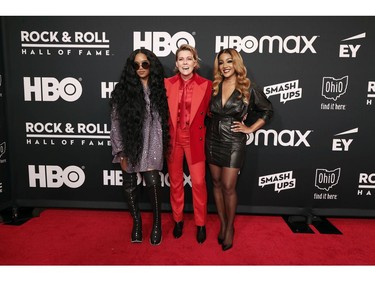 Left to right: H.E.R., Brandi Carlile and Mickey Guyton attend the 36th Annual Rock & Roll Hall Of Fame Induction Ceremony at Rocket Mortgage Fieldhouse on Oct. 30, 2021 in Cleveland, Ohio.