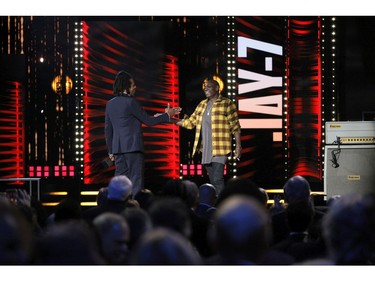 Dave Chappelle inducts Jay-Z onstage during the 36th Annual Rock & Roll Hall Of Fame Induction Ceremony at Rocket Mortgage Fieldhouse on Oct. 30, 2021 in Cleveland, Ohio.