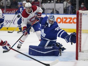 Maple Leafs goaltender Petr Mrazek (35) defends the goal as Montreal Canadiens forward Brendan Gallagher (11) waits for a pass during the second period at Scotiabank Arena.