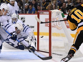 Penguins left wing Drew O'Connor misses a wide-open  Maple Leafs during the third period at PPG Paints Arena. The Penguins won 7-1.