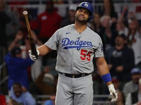 Albert Pujols of the Los Angeles Dodgers reacts to a strike out during the seventh inning of Game 6 of the National League Championship Series against the Atlanta Braves at Truist Park on Oct. 23, 2021 in Atlanta, Ga.