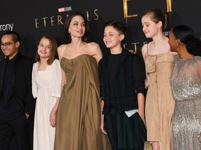 Actress Angelina Jolie and her children (left to right) Maddox, Vivienne, Knox, Shiloh and Zahara arrive for the world premiere of Marvel Studios' "Eternals" at the Dolby theatre in Los Angeles, Oct. 18, 2021.